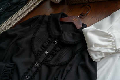 ブラックのラウンドフラットカラー長袖シャツ