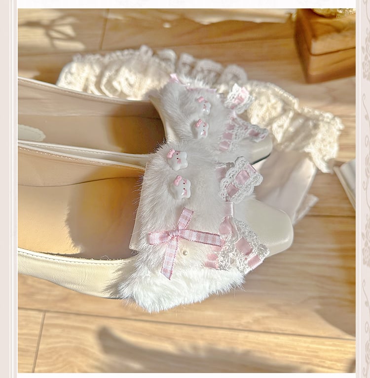 Aprikosenfarbene Slip-In-Ballerinas mit spitzer Zehenpartie und Schleife am oberen Absatz