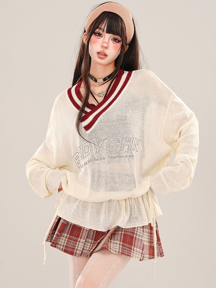 Aprikosenfarbenes, halbtransparentes, lockeres Strickoberteil mit V-Ausschnitt und gerüschter Taille