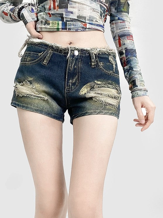 ショーツ 切りっぱなしの袖口 ダメージ加工のディテール 魅力的なY2K ほつれブルー