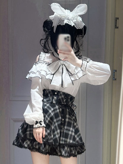 Monochrome Cutout Shoulder Long-Sleeve Bow Ruffle Blouse - YoshiKi