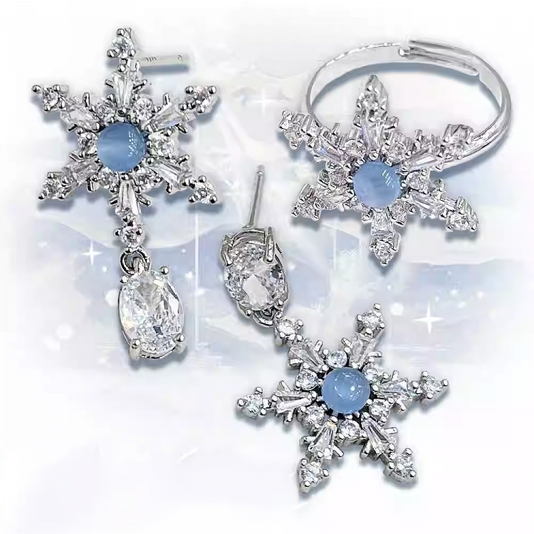 Silberne Ohrringe/Ring/Halskette in Schneeflockenform