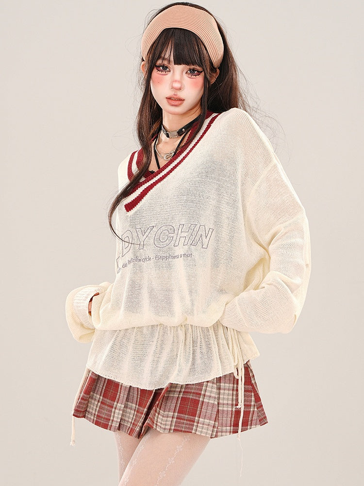 Aprikosenfarbenes, halbtransparentes, lockeres Strickoberteil mit V-Ausschnitt und gerüschter Taille