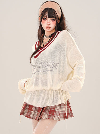 Aprikosenfarbenes, halbtransparentes, lockeres Strickoberteil mit V-Ausschnitt und gerüschter Taille