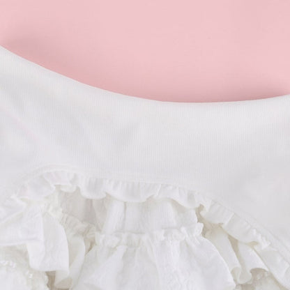 Layered White Ruffle Mini Skirt with Cross Accent & Lining - serendipity