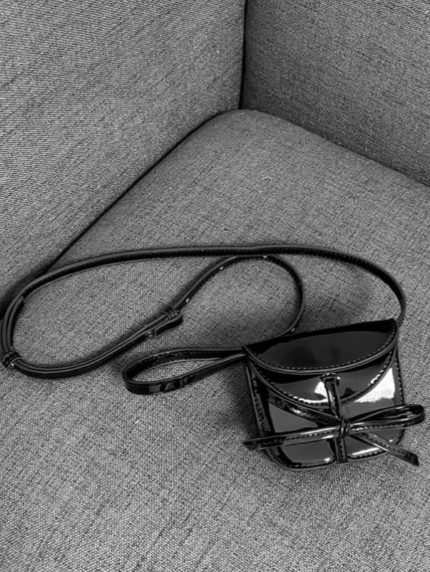 Chic Black Crossbody Card Holder With Glossy Finish And Bow Accent