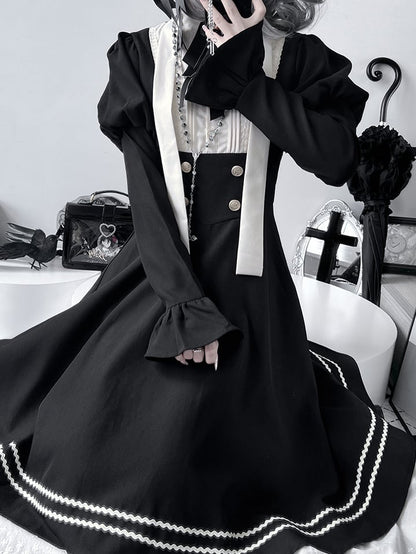 Schwarzes Nonnenkleid mit Rüschenbesatz und langen Ärmeln