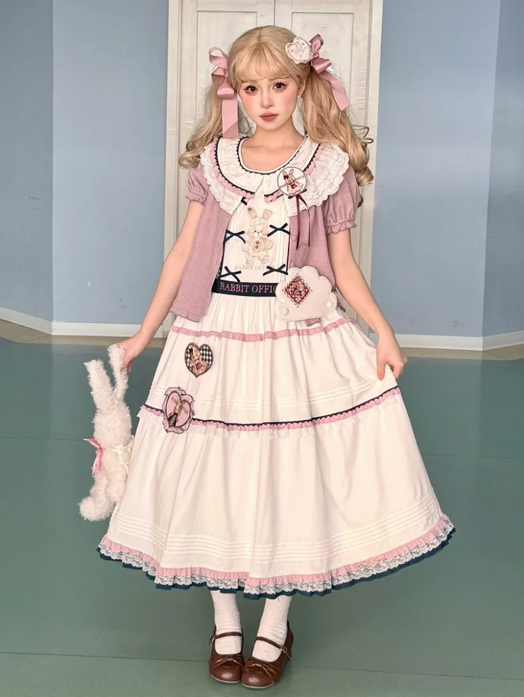 Rosa Strickjacke mit kurzen Puffärmeln