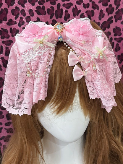 Haarspange mit Blumenanhänger und Strasssteinen in Rosa