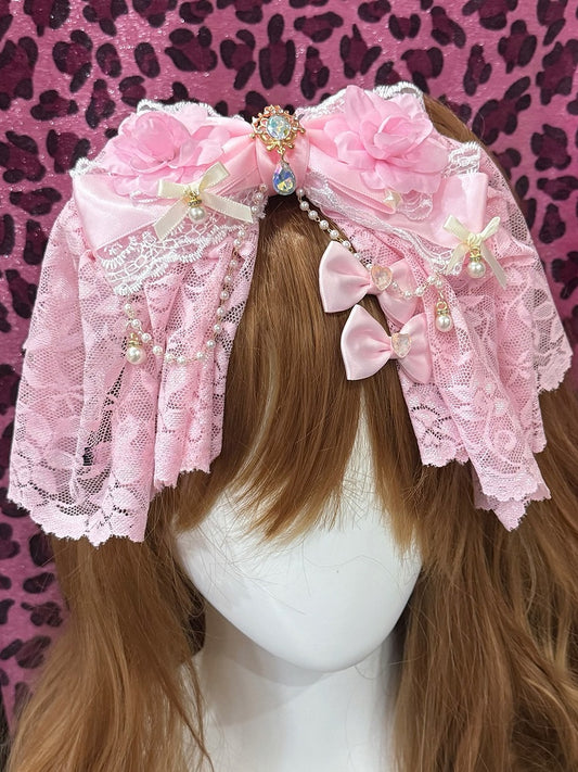 Haarspange mit Blumenanhänger und Strasssteinen in Rosa