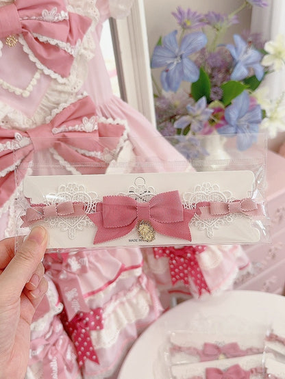 詳細 ピンクの蝶結びチョーカー