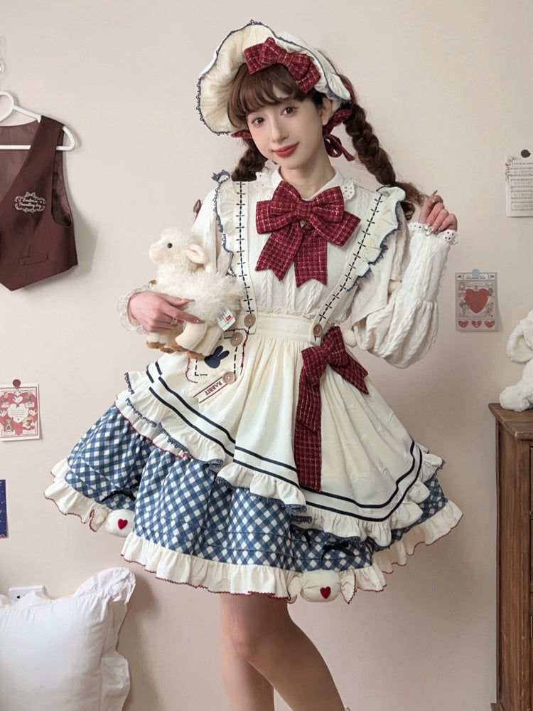 Cremefarbene Haube mit roter Schleife