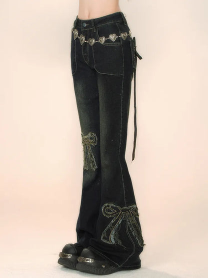 Jeans mit Schnürung und Schleife, schwarz, hinten ausgestellt