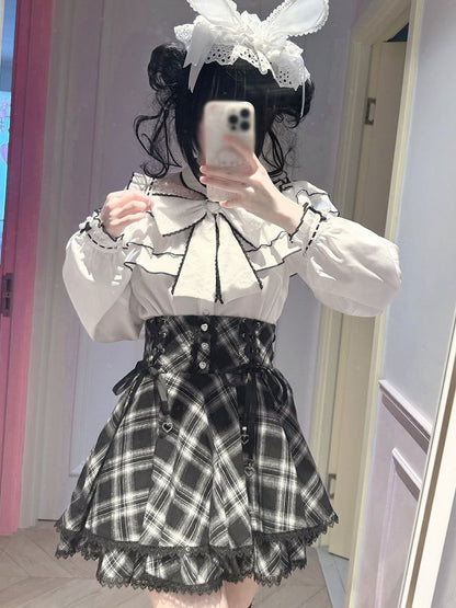 Monochrome Cutout Shoulder Long-Sleeve Bow Ruffle Blouse - YoshiKi