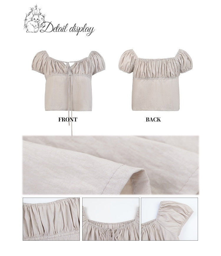 ベージュのパフスリーブ、セルフタイストラップネックライントップス