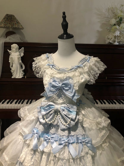 Hime Lolita-Rock mit Schleifen und blaues Hanayome-Stufenkleid mit weißer Dekoration