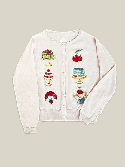 Aprikosenfarbene Strickjacke mit langen Ärmeln und Dessert-Print