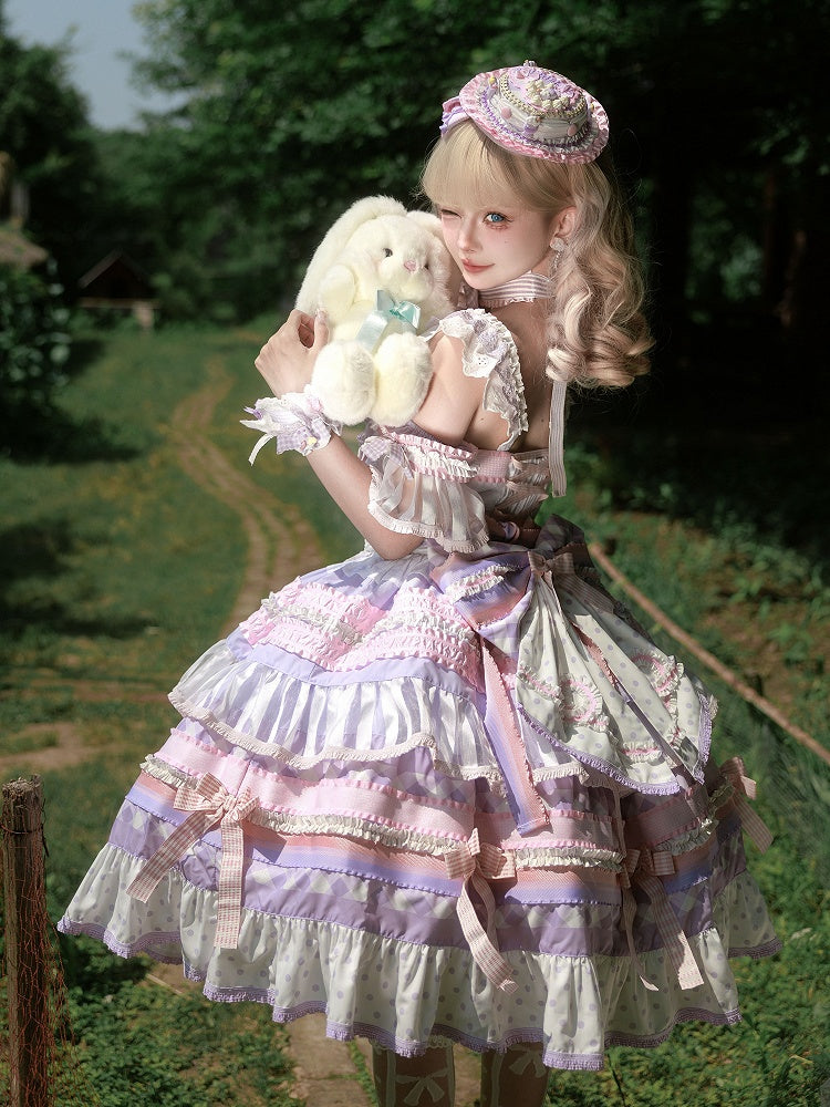 Gestuftes Lolita-Rock mit lila Akzenten, Kuchen-Taro-Paste, süßes Schleifenkleid