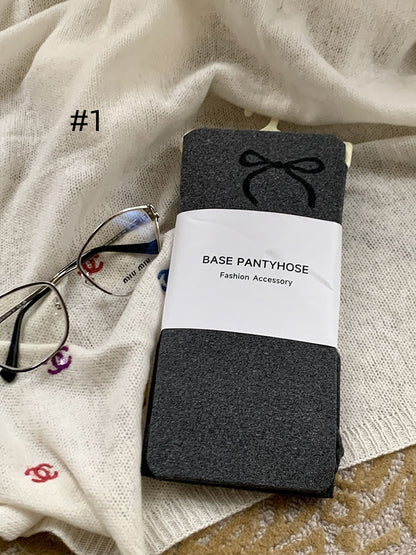 蝶結び柄タイツ