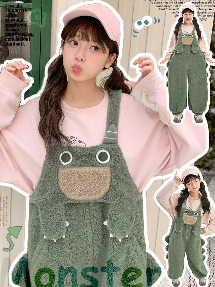 かわいい恐竜の緑のぬいぐるみオーバーオール