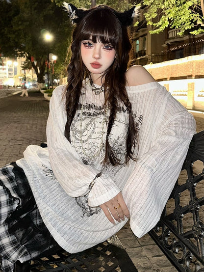 Schwarz/weißes, locker sitzendes, bedrucktes Oberteil mit asymmetrischem Ausschnitt