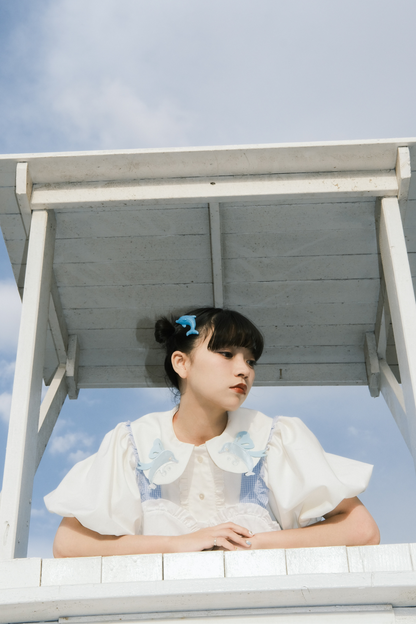 Prinzessinnenkleid mit Ballonärmeln und Schleife