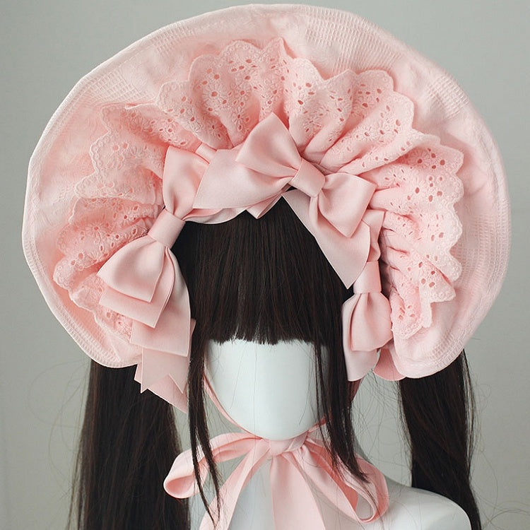 コットンの蝶結びディテール、レーストリムのボンネット