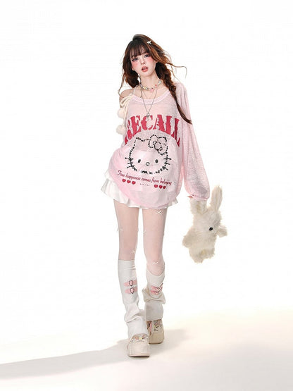 Halbtransparentes Sonnenschutz-Top mit Kätzchen-Print und Pompon-Akzenten in Rosa/Weiß mit asymmetrischem Ausschnitt