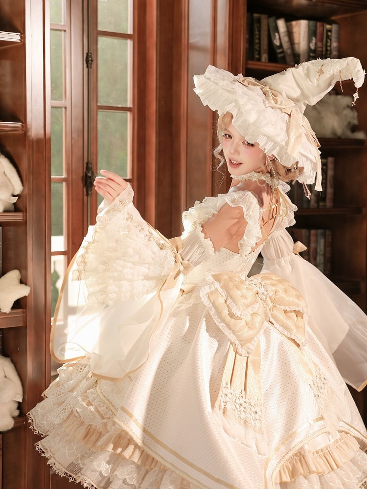 Witch-Themed Cross Accent Lolita JSK Full Ensemble in White and Gold with Oversized Bow Train, Cape, Detachable Sleeves, Hat and Outer Sleeves - Felinae Cookie