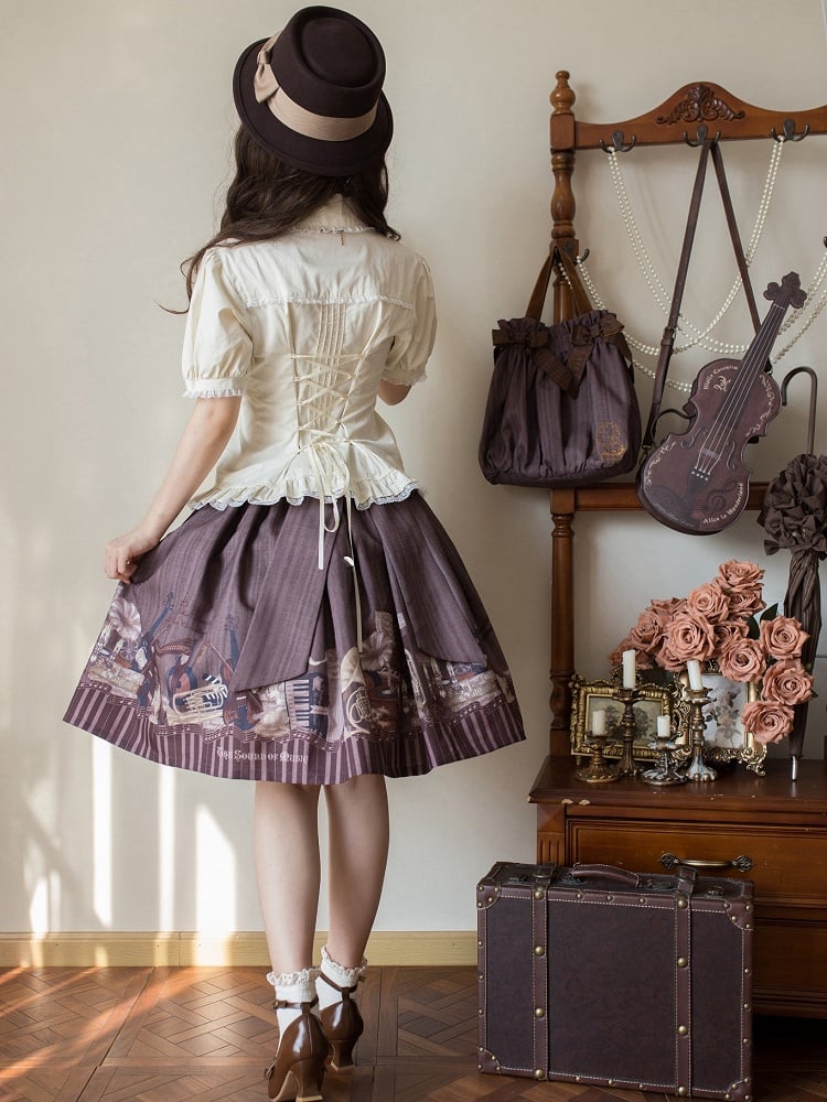 ベージュのプリーツボディスショートパフスリーブシャツ