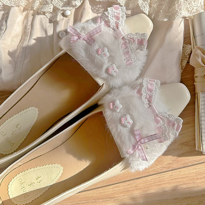 Aprikosenfarbene Slip-In-Ballerinas mit spitzer Zehenpartie und Schleife am oberen Absatz