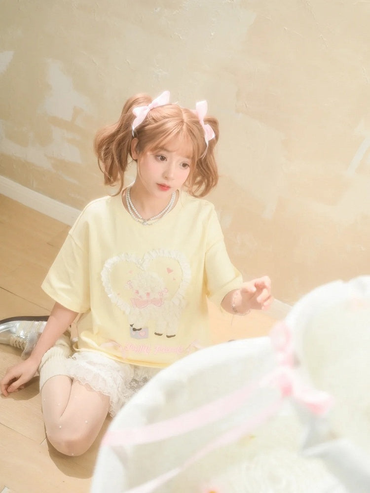 イエローのプラッシュラムアップリケフリルハートルーズTシャツクリーミー