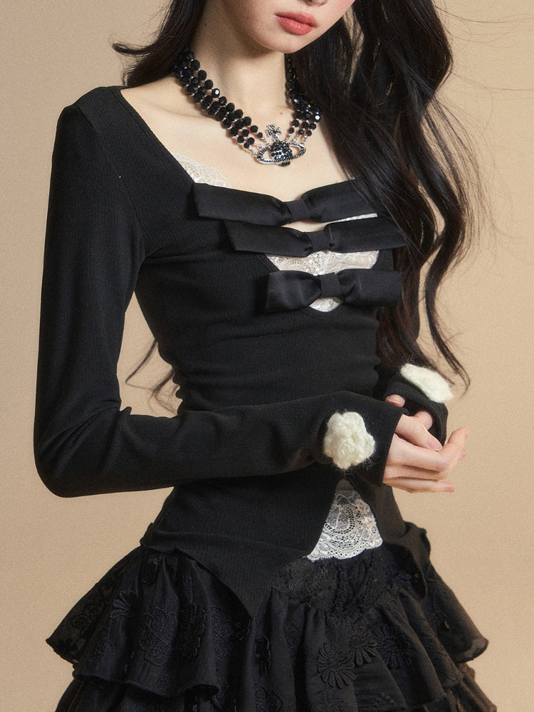 Spitzenaufnäher, glamouröse Details, kontrastierende weiße Schleifen, V-Ausschnitt, schwarzes Strickoberteil