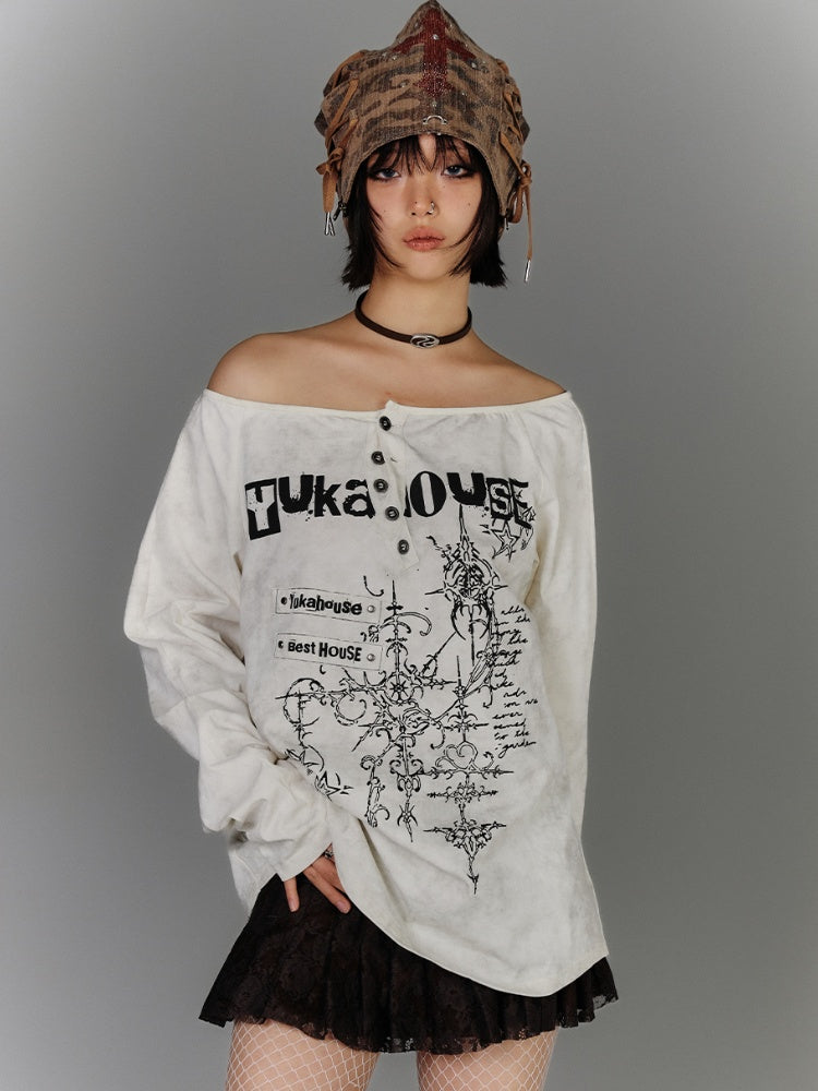 Aprikosenfarbenes, schulterfreies Baumwolltop mit Grafik und Used-Look-Ausschnitt