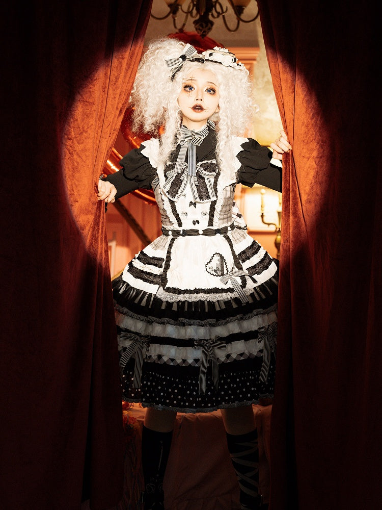 Lolita-Kleid mit Schleifenrock und schwarzem Stufenkleid mit weißen Oreo-Kuchenakzenten