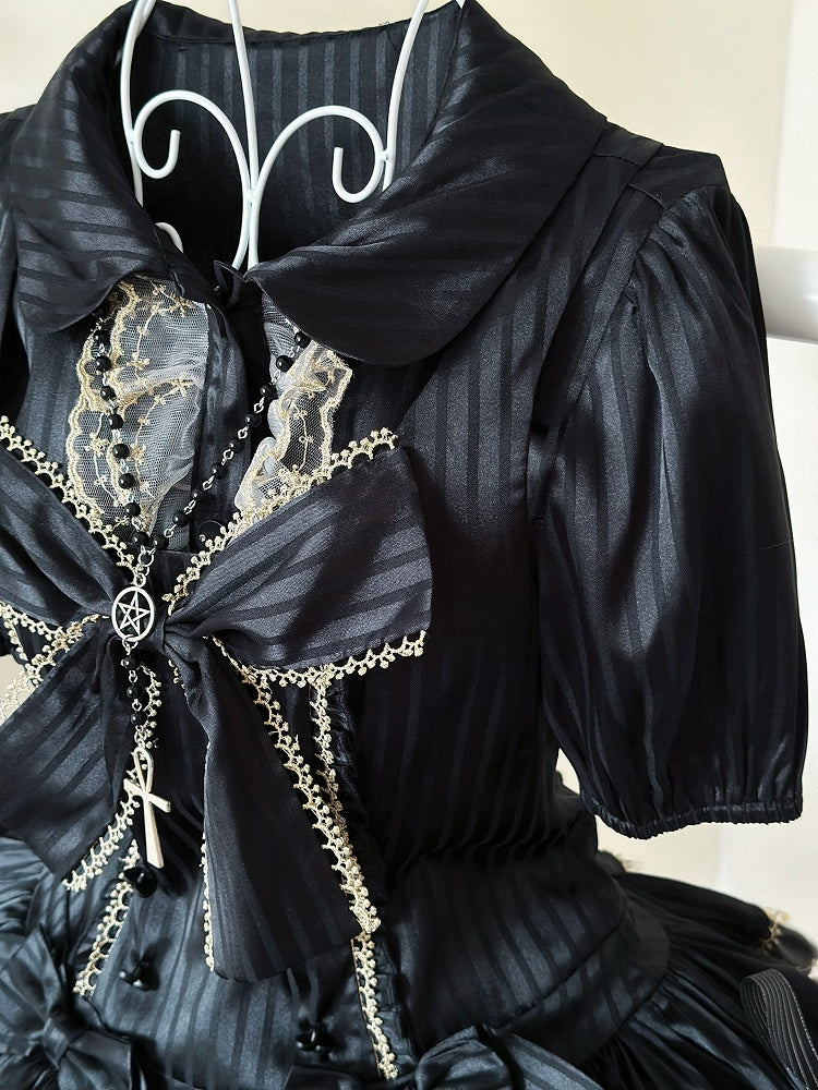 Bluse schwarz elastisch gestreift und kurze goldene Manschetten Stoffärmel