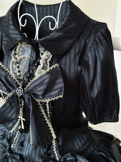 Bluse schwarz elastisch gestreift und kurze goldene Manschetten Stoffärmel