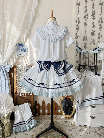 Blue Tassel Train White with Decorations Bow Dark