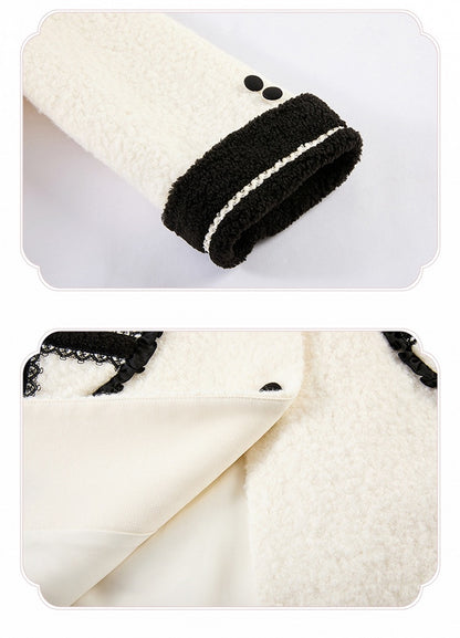 Schwarze herzförmige Wolltaschen mit weißer Stickerei und Mantel