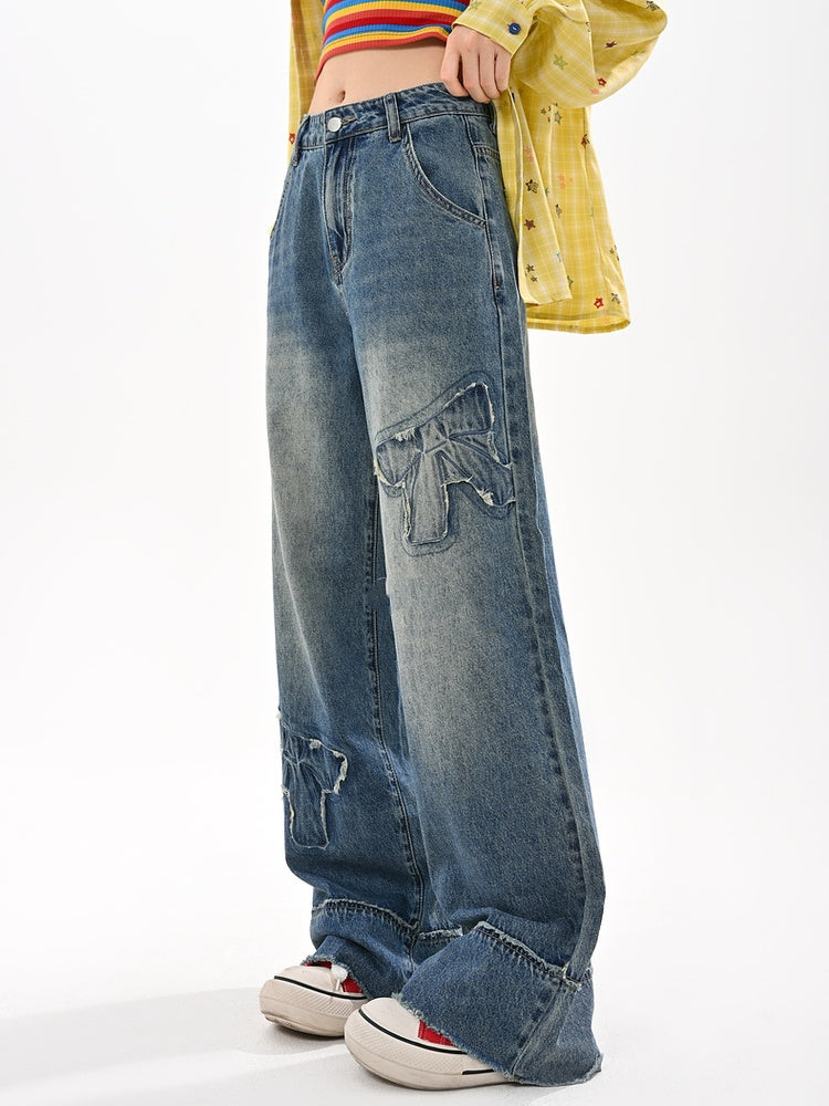 未加工ワイドレッグジーンズ ウエストリボンアップリケ ブルー ローヘム ヴィンテージ