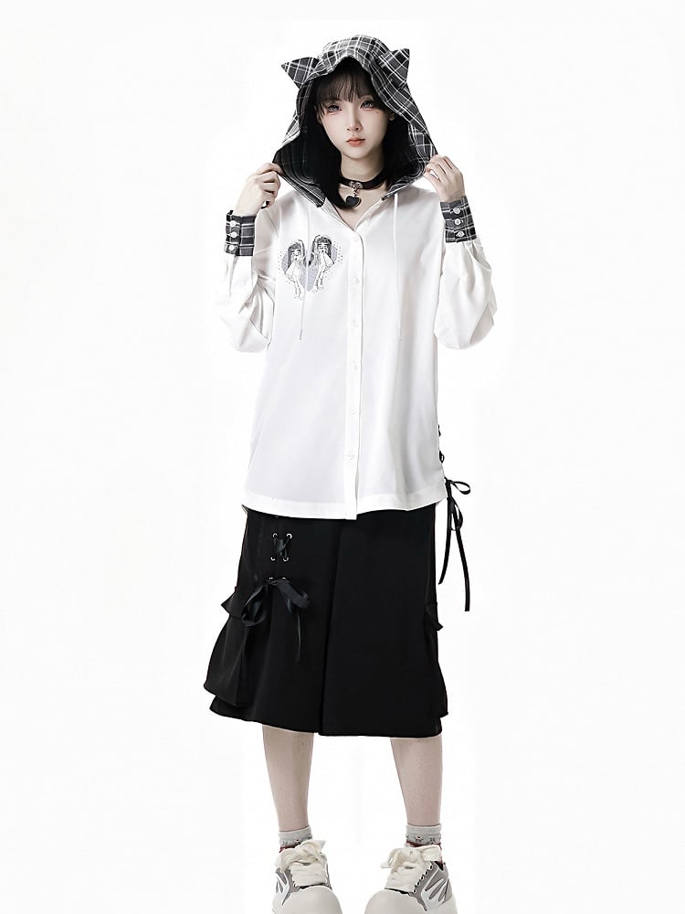 レースアップディテールのワイドレッグショーツ、ウエストはブラック/チェック柄、伸縮性あり