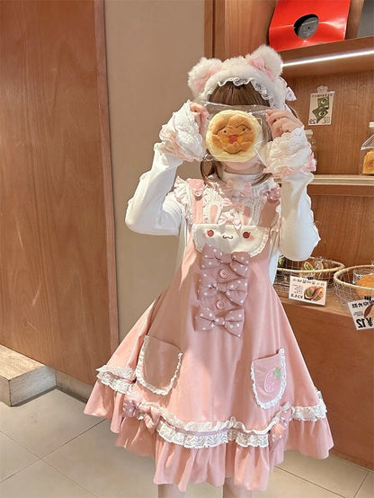 水玉模様の蝶結びロリータジャンパースカートのディテール、ウサギの耳のデザイン、甘いウエストフード、ピンク