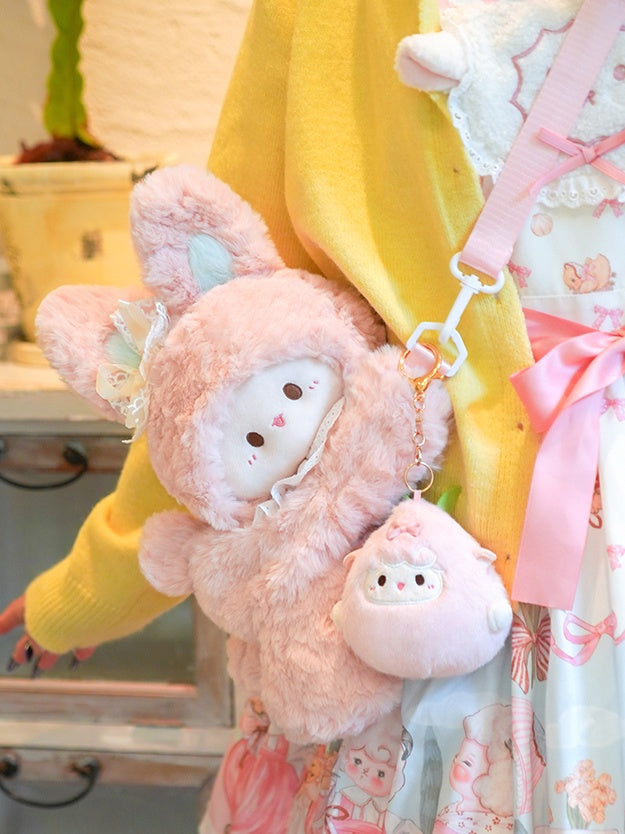 Rosa süßer Schlüsselanhänger mit Schleife in Lammform