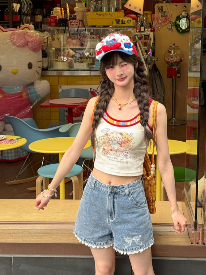 Blaue Jeansshorts mit Schleifenstickerei an den Bündchen und Spitzenbesatz