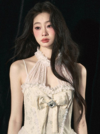 アプリコットホルターネックリボンティアードスカートドレス