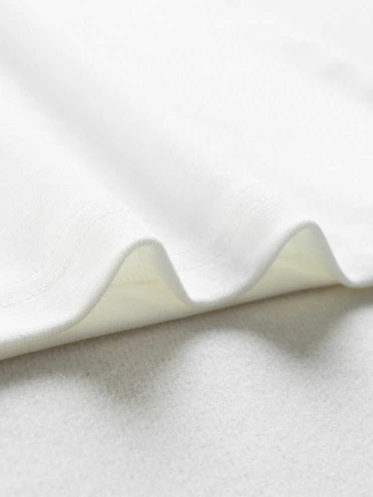 Kawaii White Slim Crewneck Tee with Music Note Embroidery and Button Accents - Languid Park