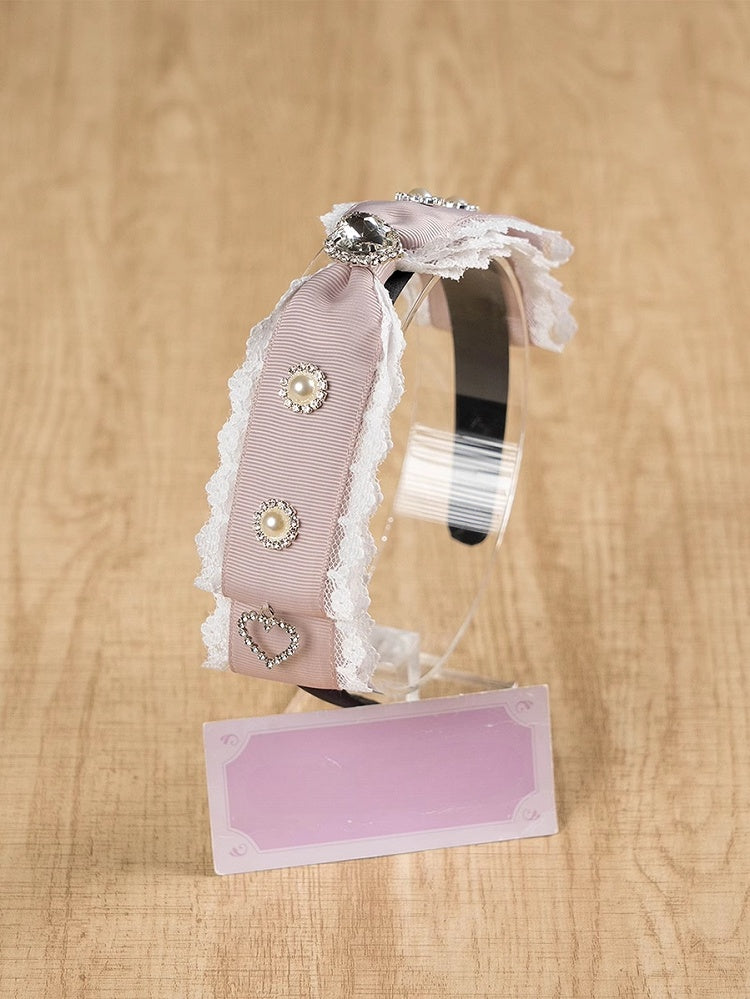 ジライケイ ラインストーンとビーズで飾られたレーストリム 蝶結び KC