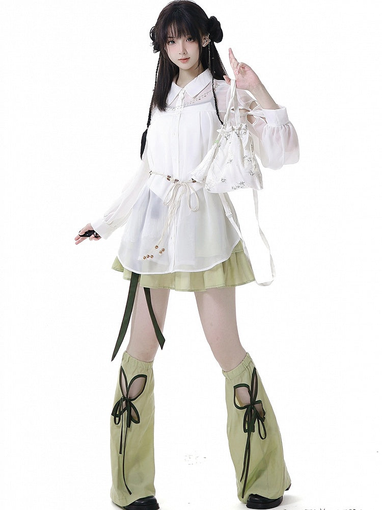 グリーンのチャイナドレス、ティアードスカート、ウエストベルト付き、伸縮性のあるウエストスタイル