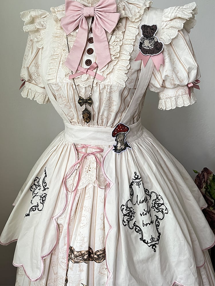 Lolita Jakobsmuschel rosa cremefarbene Schürze mit weiß gesticktem süßen