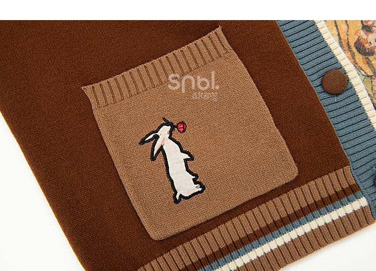 Stickerei und Strickjacke Braunes Häschen Gänseblümchen